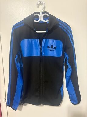 adidas Black Jacket with Blue Trim and Trefoil Logo